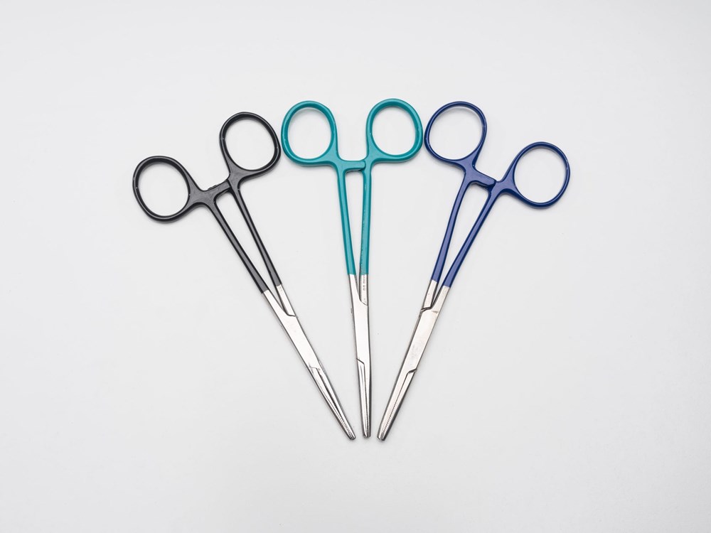 Medical-grade, stainless steel forceps for use to remove used blades from a dermaplaning handle (non-attached).