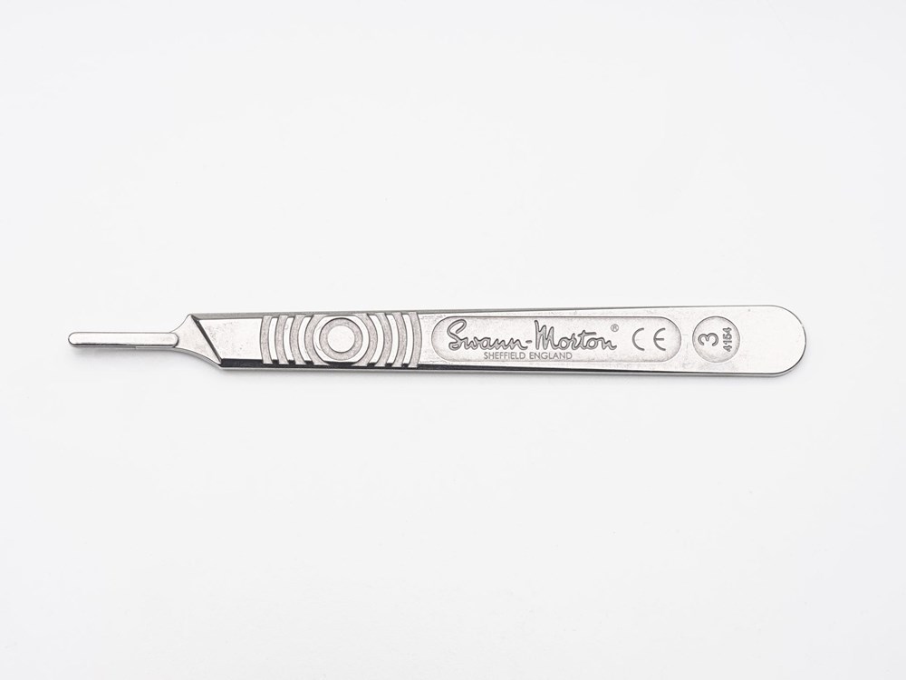 Stainless steel Swann-Morton dermaplaning handle for use with #10R, #10D, #10S, #10, and #14 disposable blades.